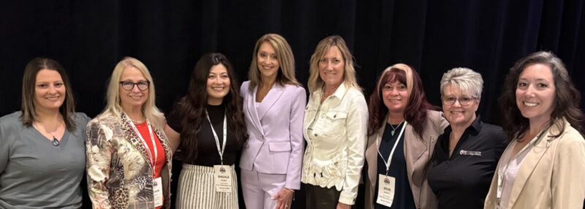 Nancy Post with a group of attendees at Women in Mining USA 2025